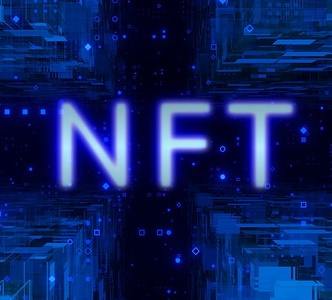 An image of NFT text over a blue circuit board.